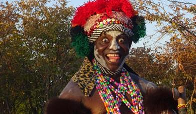 Meeting traditional cultural dancers in Zambia is a unique experience for European tourists 