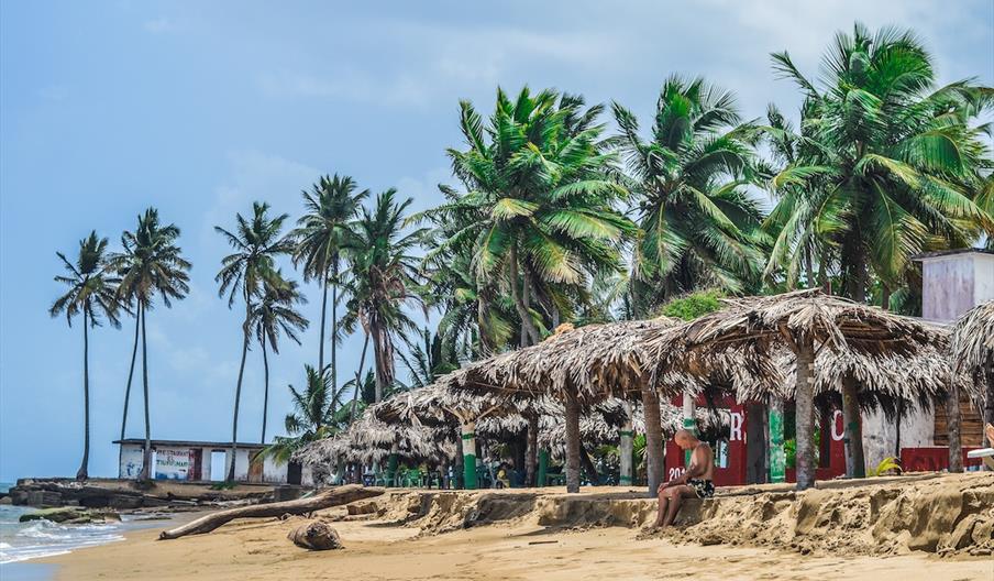 Sheltering from the sun on a tropical beach