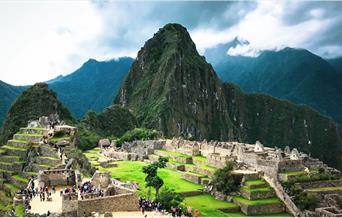 Tourists enjoying Machu Picchu