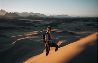 Walking in the sand dunes