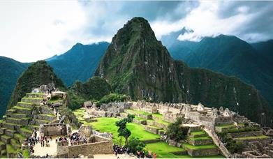 Tourists enjoying Machu Picchu