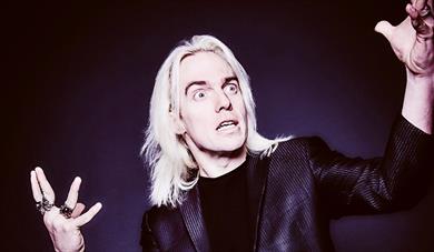 John Robertson plays with his Audience