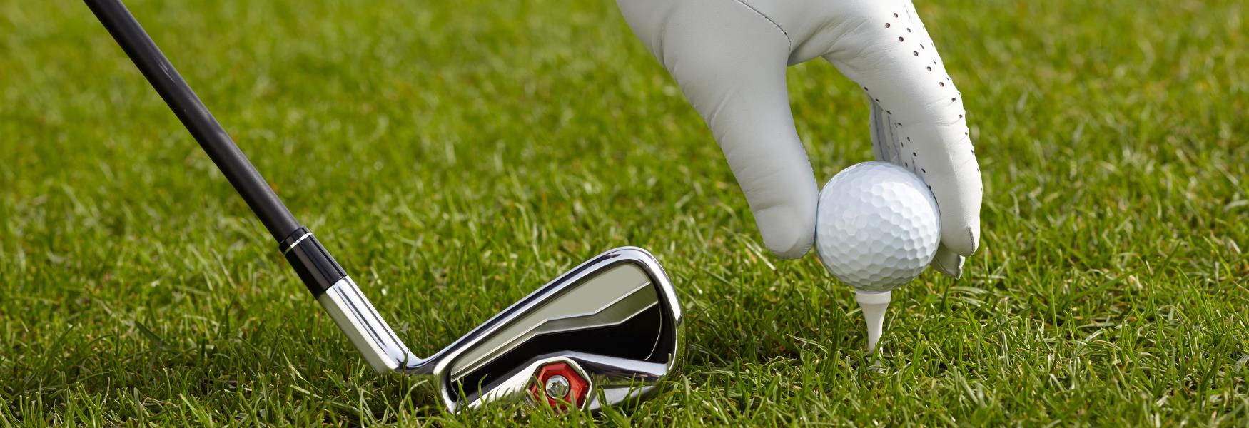 image shows golf club and golf ball