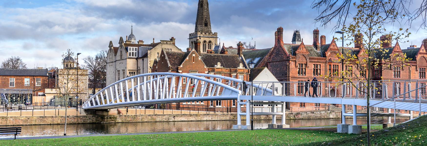 image shows building and bridge in bedford