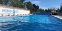 people swimming at woburn lido