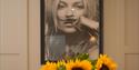poster of kate moss at harper luxe apartment