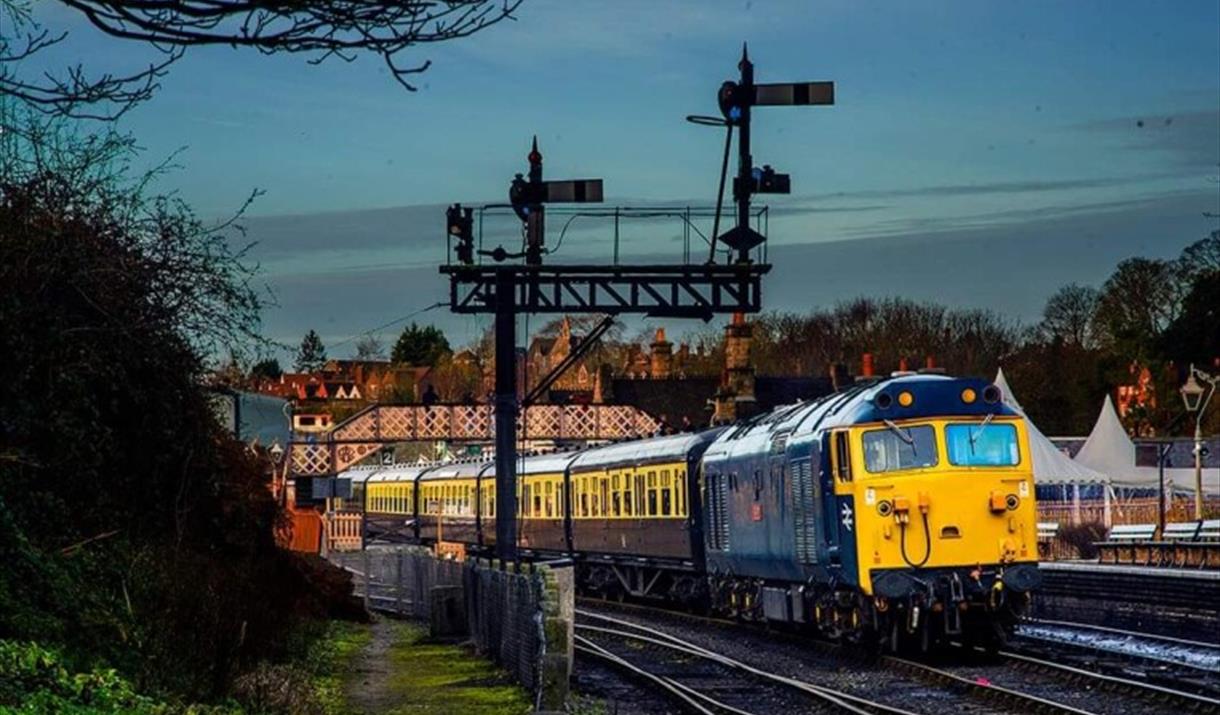 Class 50 departs Bridgnorth Station at dusk