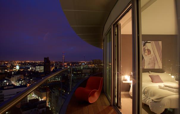 Enjoy panoramic city views from the comfort of your Staying Cool kingsize bed at Rotunda Birmingham