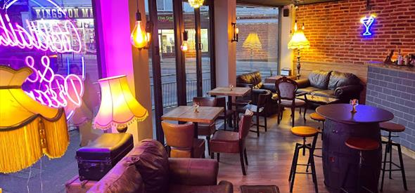 Inside bar with colourful pink lights