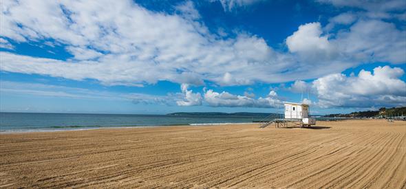 Durley Chine beach featuring RNLI Lifeguard tower