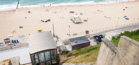 Fisherman's Walk Cliff lift with seafront view featuring sandy beach and blue sea