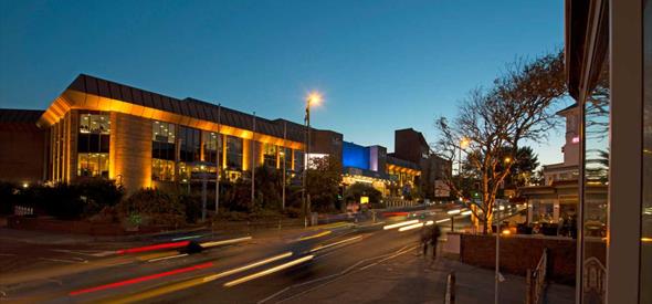 BIC lit up at night taken from across the street in bournemouth