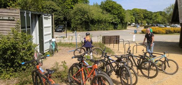 Bikes locked up safely outside the cycle hire location.