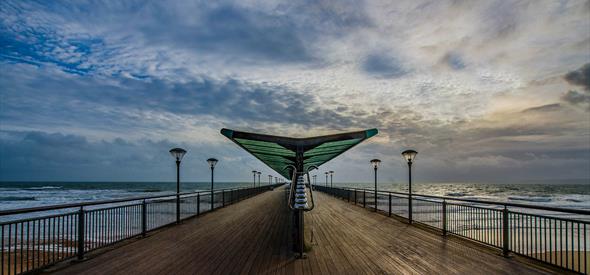 Moody skies over Boscombe pier in Bournemouth