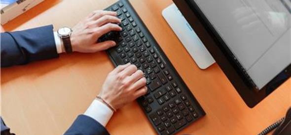 Hands on keyboard using the computer