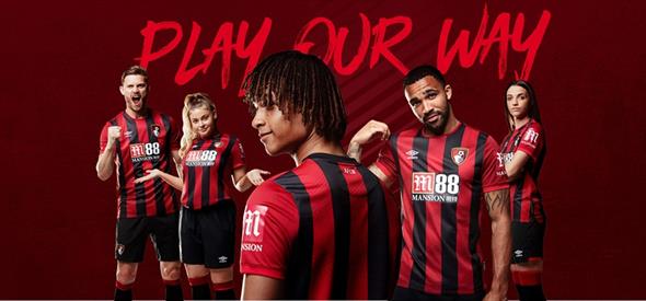 Players model the AFCB home kit with the slogan 'play our way'