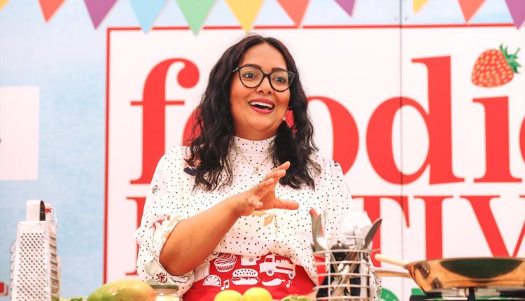 Woman giving a food talk at the foodie festival