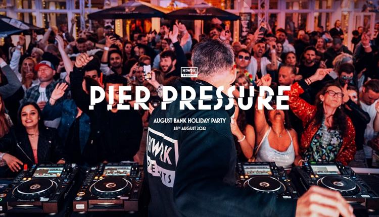 Image of people partying in front of a DJ with the words 'Pier Pressure' across it.