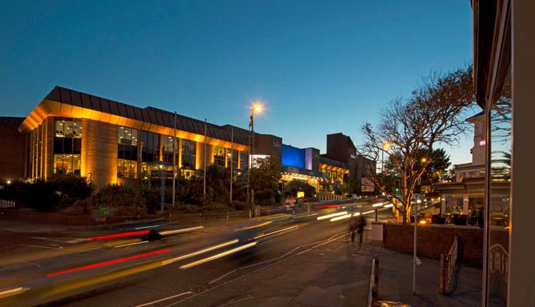BIC lit up at night taken from across the street in bournemouth