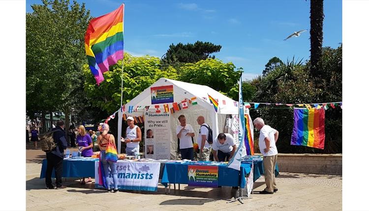 Photo of Dorset Humanists Information Tent with people