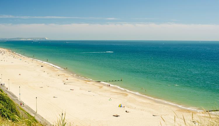 Fishermans walk beach from the overcliff on a clear summers day