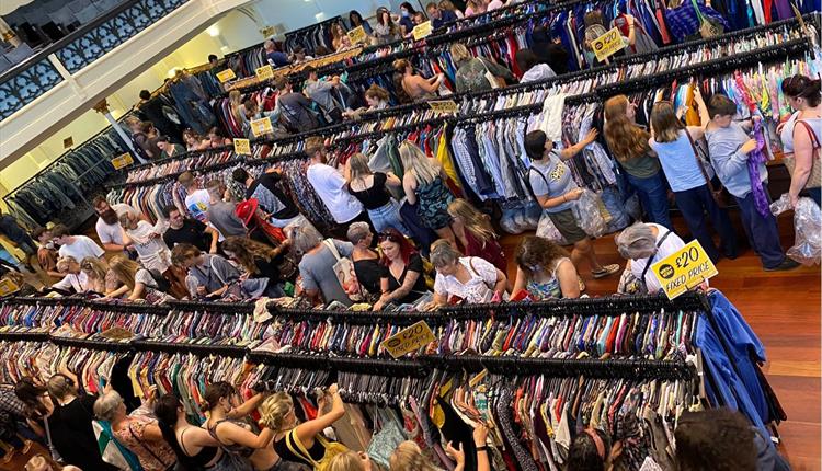 overhead image of shoppers at a vintage sale