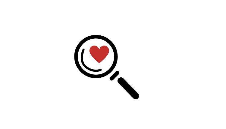 Cartoon magnifying Glass with heart in the middle