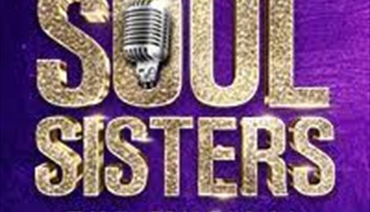 Purple background With 'Soul Sisters' in gold lettering.