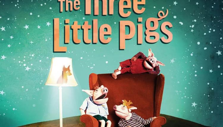 Three Little Pigs on a red chair with a starry night background