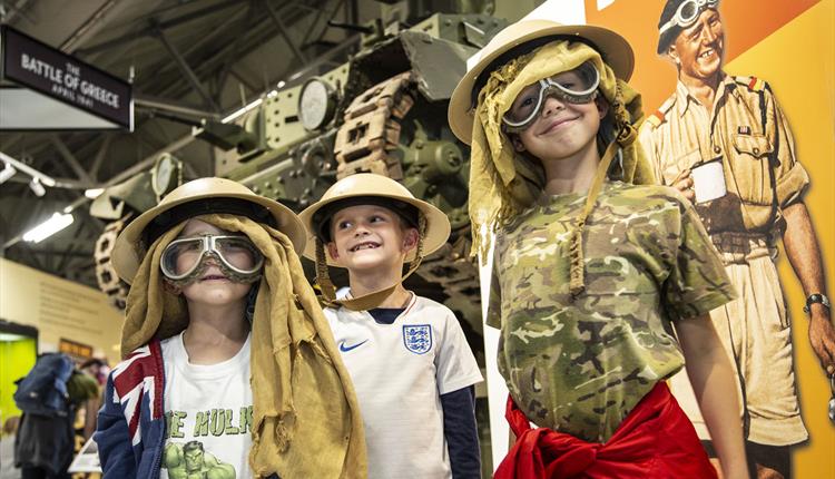 Children dress up with hats and cloths and goggles