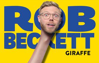 Photo of Rob in a comedy pose - looks like he has a long neck!