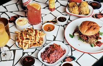 burgers and chips on the table