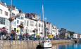 Picture of shops and a boat in a quay