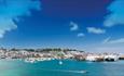 Picture of a harbour with boats and blue skies