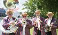 Acoustic Jazz ban dressed in barber shop clothes playing at Beaulieu