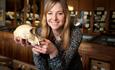 photo of Alice Roberts on tour with a skull