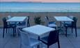 Terrace of restaurant overlooking beach