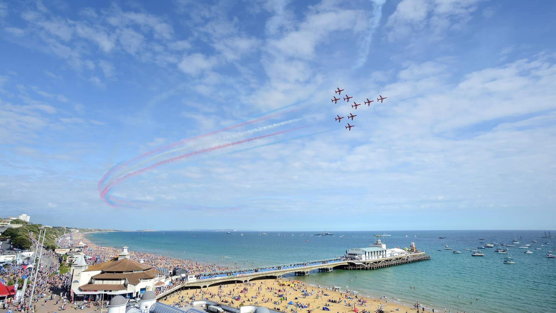 The red arrows flying over the crowds on Bournemouth beach and Pier
