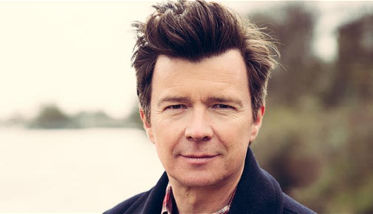 Recent photo of Rick Astley outdoors.