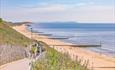 Visitors walking towards Southbourne beach via th zig zag hill on the overcliff