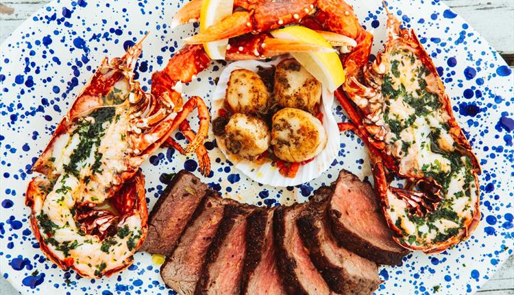 Surf and turf on blue plate