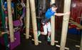 Kids having fun at the course in the rock reef obstacle course