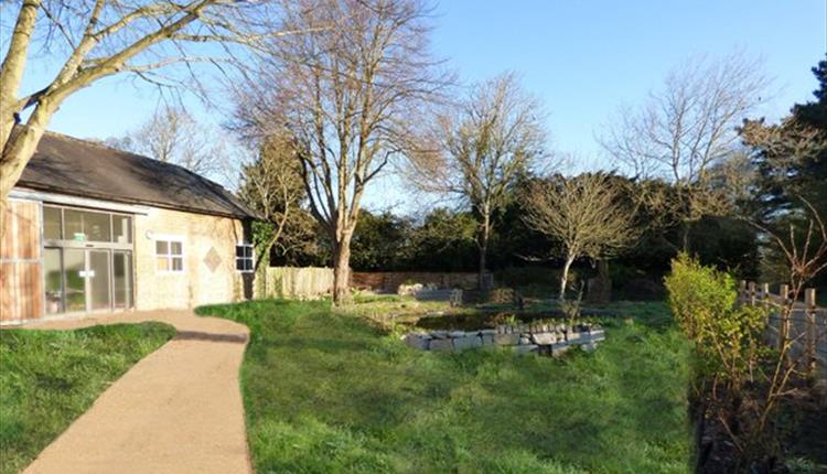 a photo of Kingfisher Barn Visitor Centre on a bright sunny day