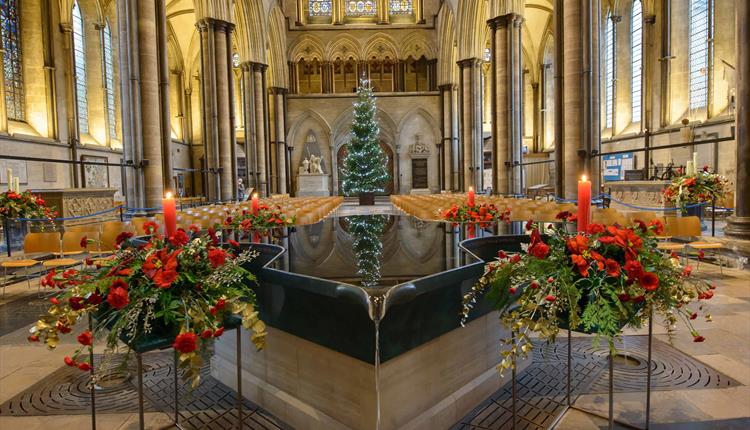 Interior grand cathedral with Christmas themed flower display