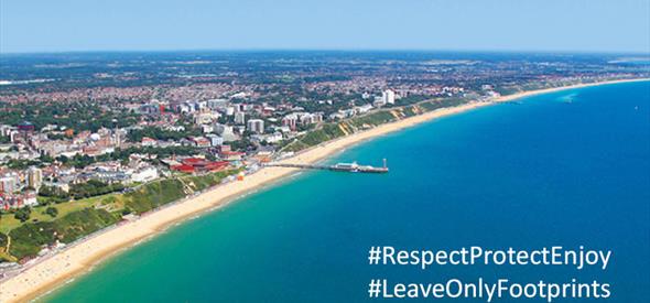 Bournemouth beach with message overlay: #RespectProtectEnjoy #LeaveOnlyFootprints