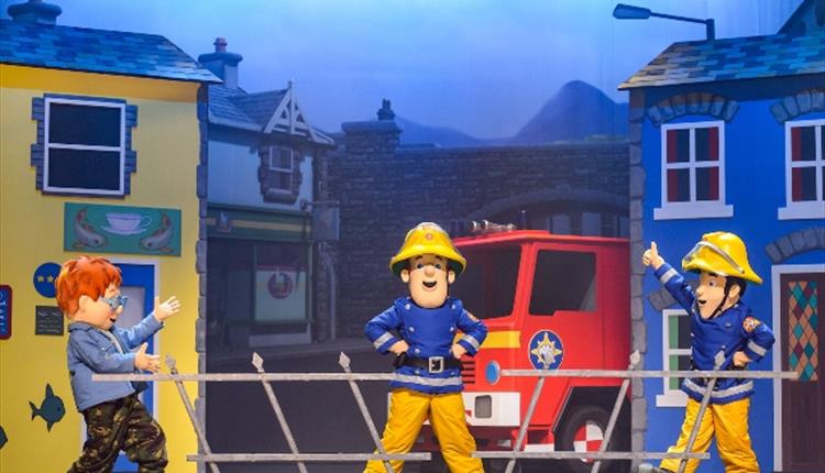 Image of three fireman Sam characters mid show.