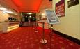 Inside the Regent Centre with red and gold carpet.