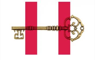 A gold key with red stripes forming the letter H
