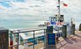 Glorious sunshine beats down upon the Dorset Belle docked at Bournemouth Pier