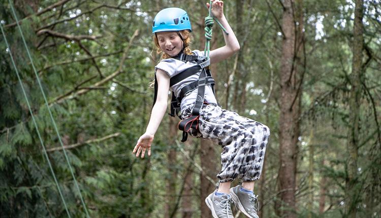 Girl enjoying a Woodland Adventure Day